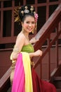 One woman in THAI RETRO DRESS is posing for a photograph.